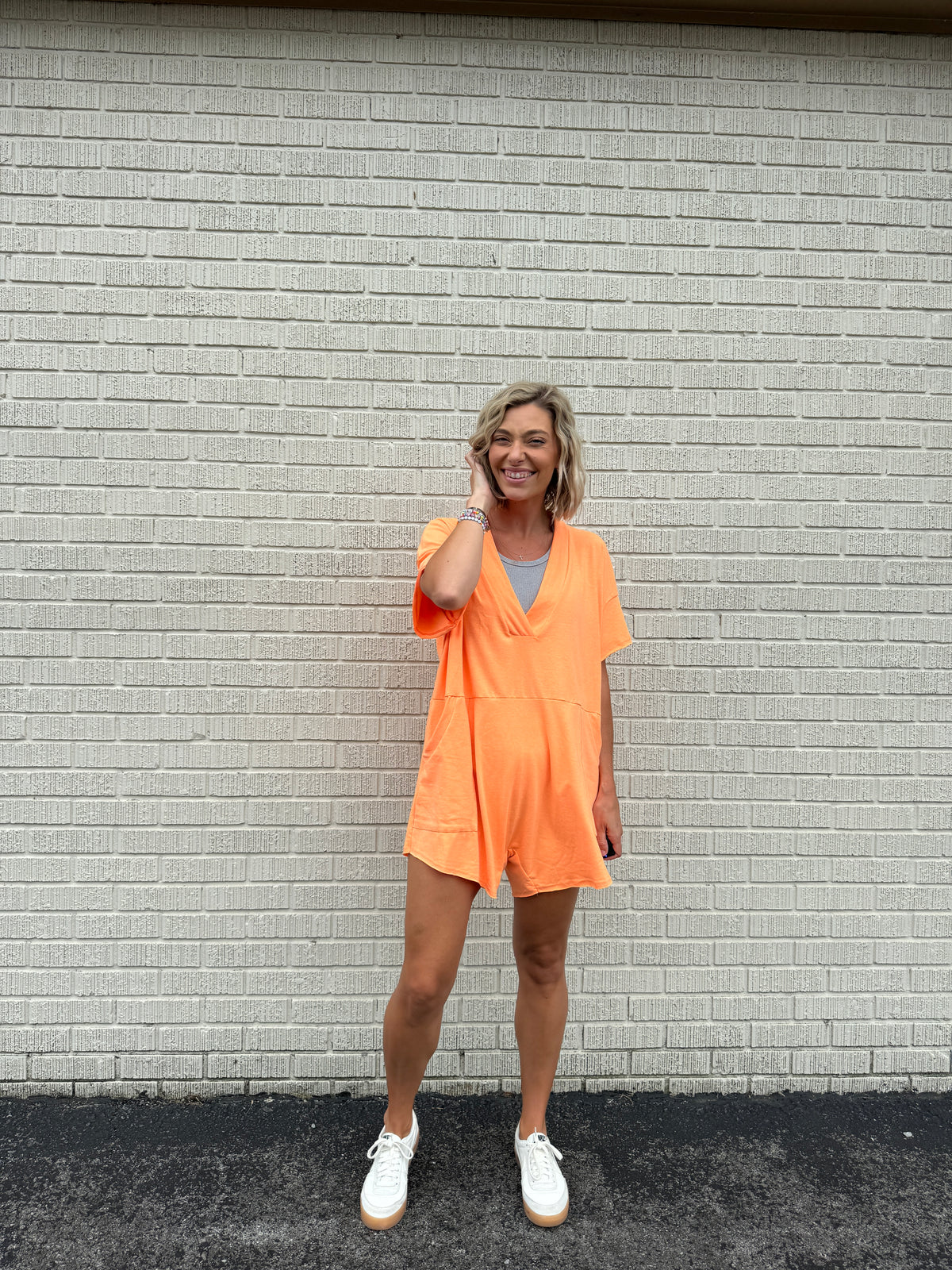 joyful romper in orange