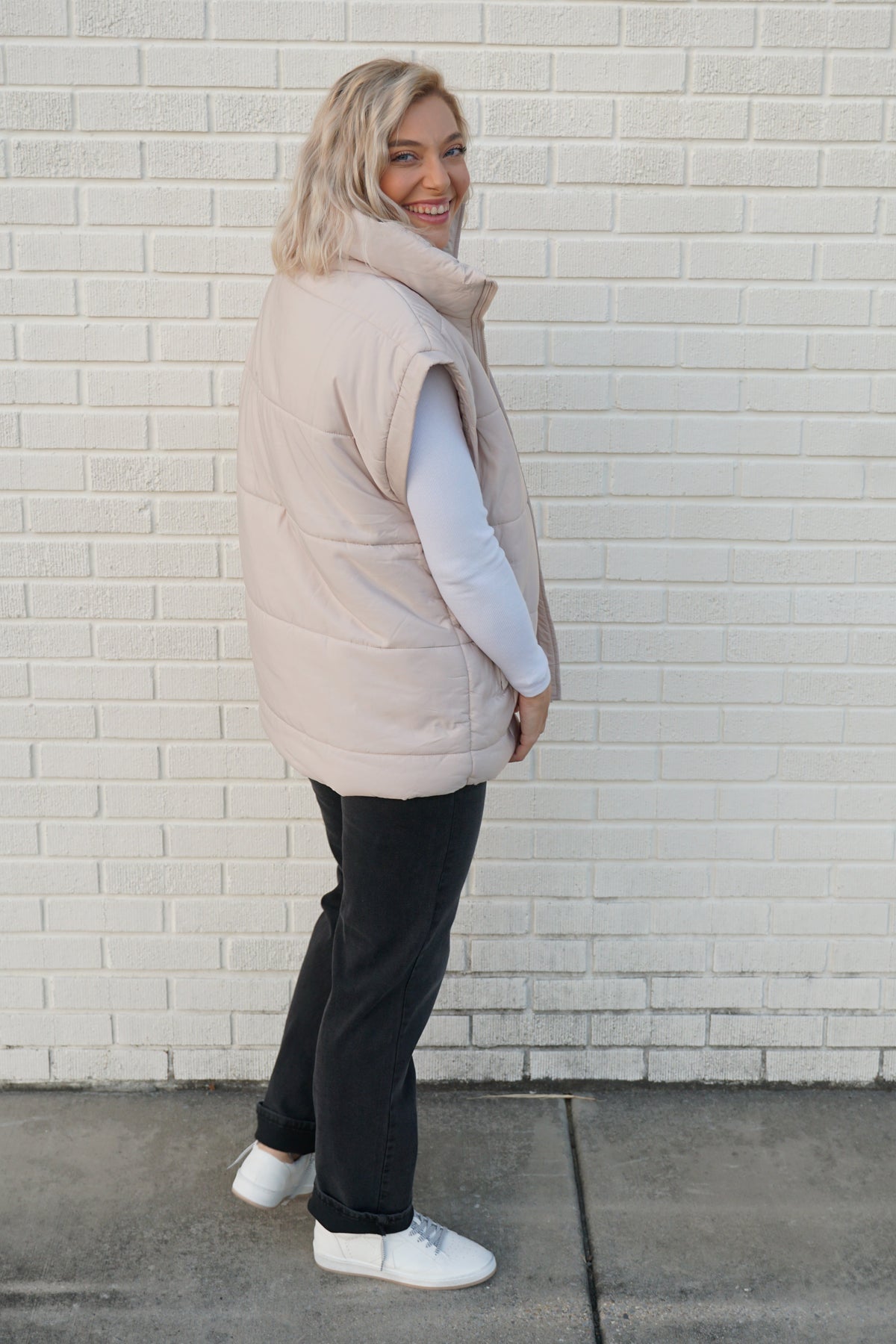 the perfect puffer vest in sand