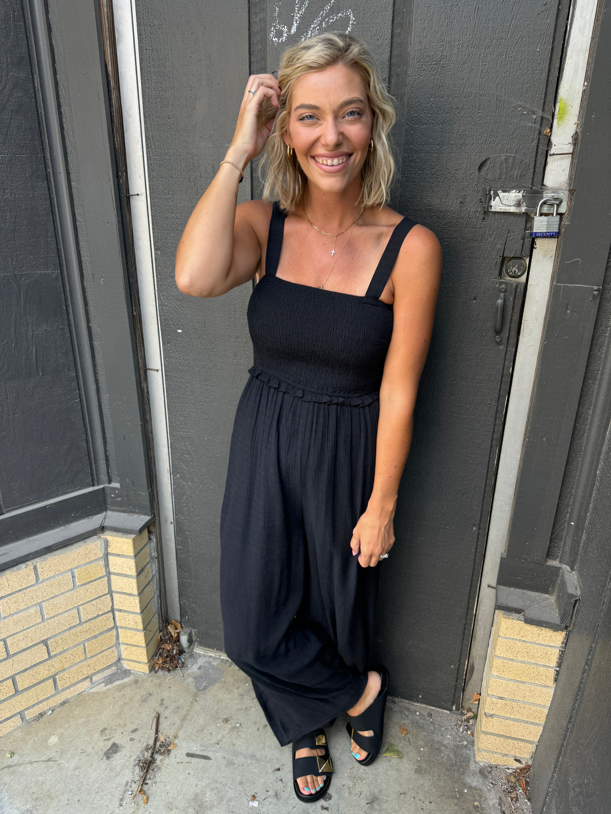 sara smocked jumpsuit in black