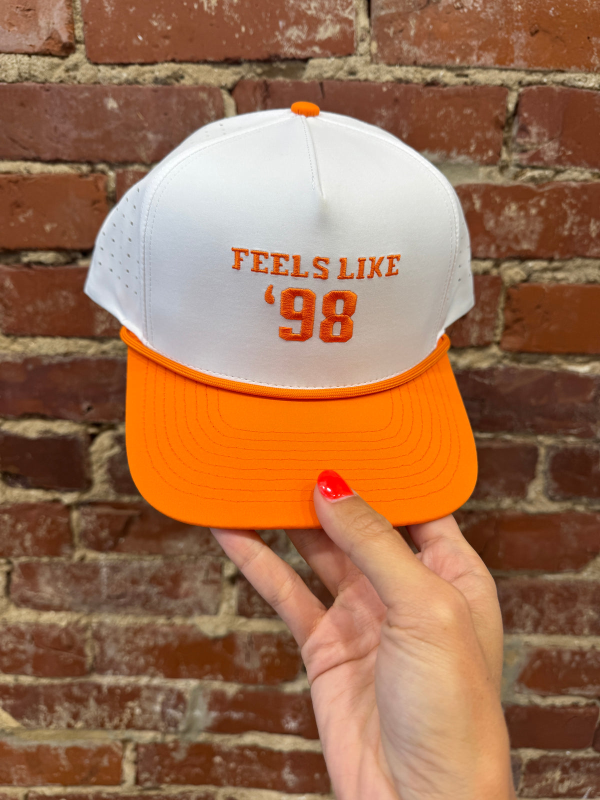 white feels like 98 hat