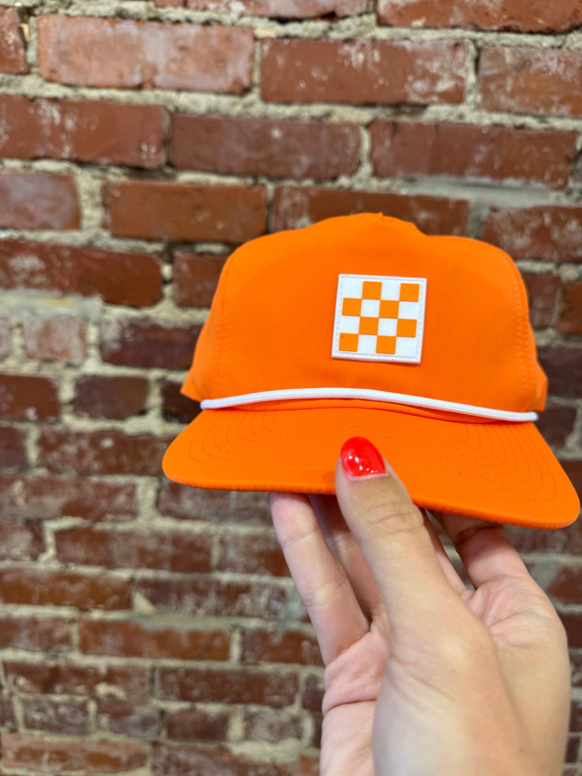 orange checkered rope hat