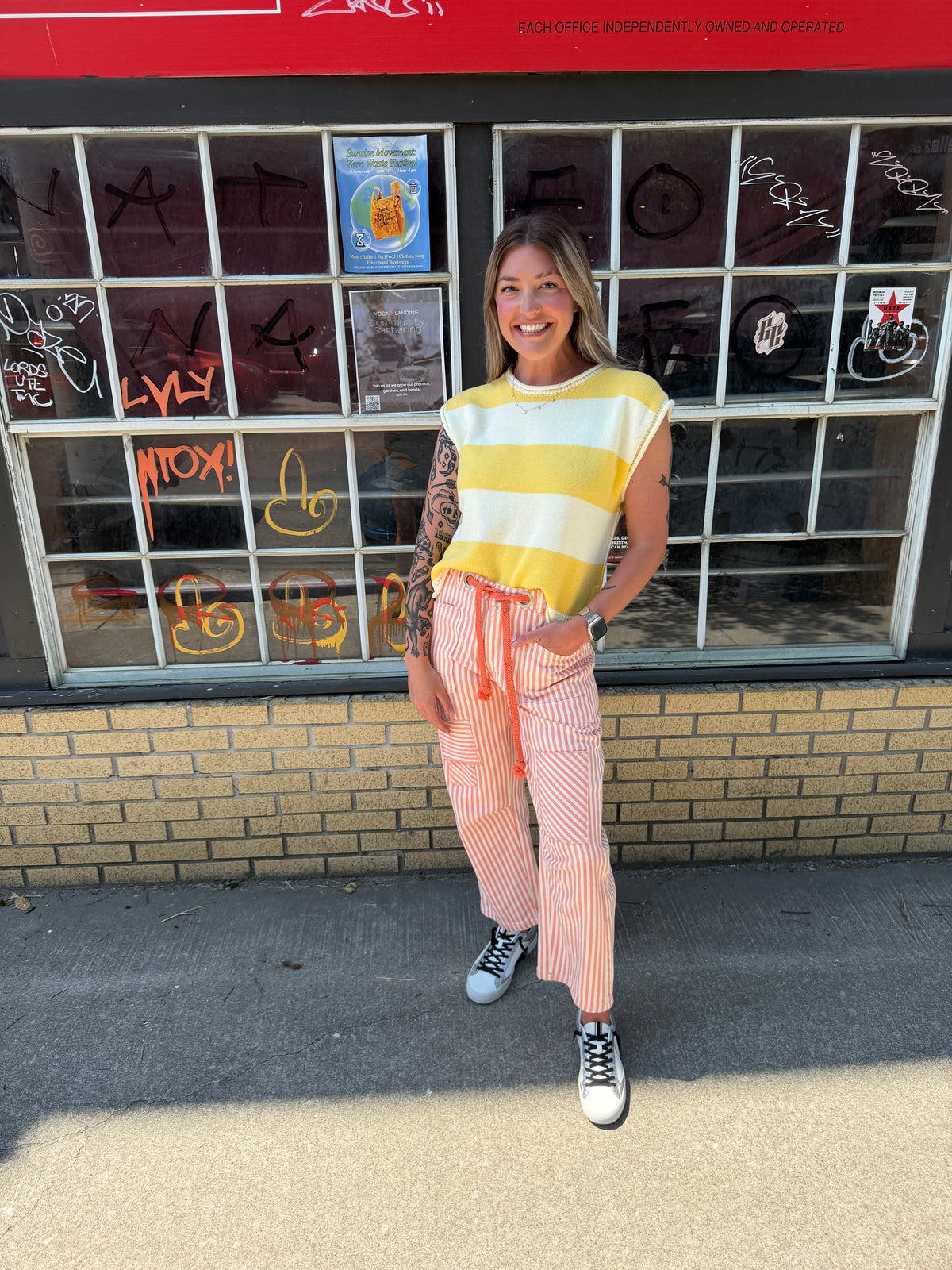 yellow striped sleeveless sweater